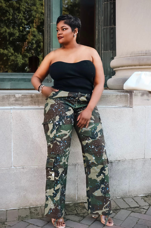 Edgy Chic: Black Bustier Top and Green Camo Cargo Pants