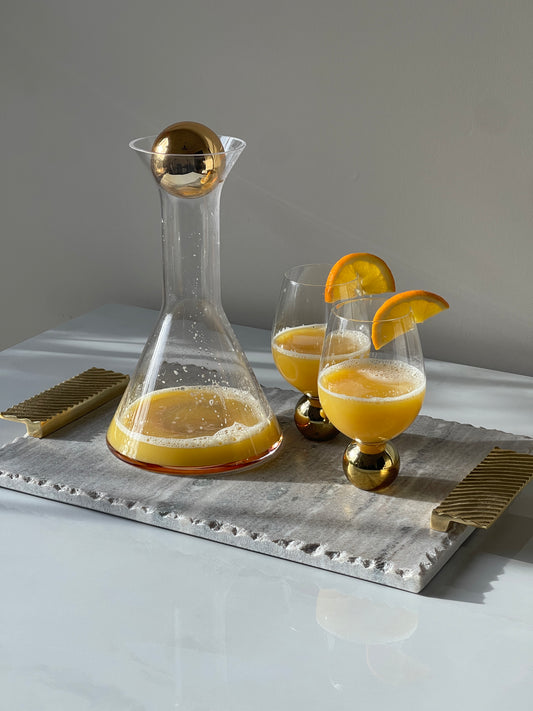 MODERN DECANTER WITH GOLD BASE AND GOLD GLASS BALL STOPPER